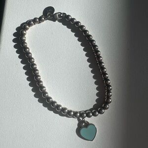 Tiffany silver blue heart bracelet.